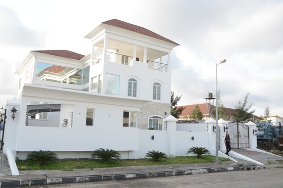 Photo of Linda Ikeji's mansion via her blog . The 3-floor house includes: 6 en-suite bedrooms, a master suite, 2 living rooms, a cinema room, a gym, and a swimming pool amongst other features.