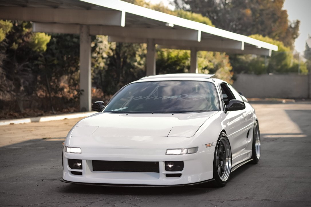    The front also uses carbon-fiber fenders and  GReddy side rockers . The pop-up headlights stayed because they're such an important part of the MR2's personality, but the lighting itself was modernized with  Morimoto sealed-beam LEDs .  One of my f