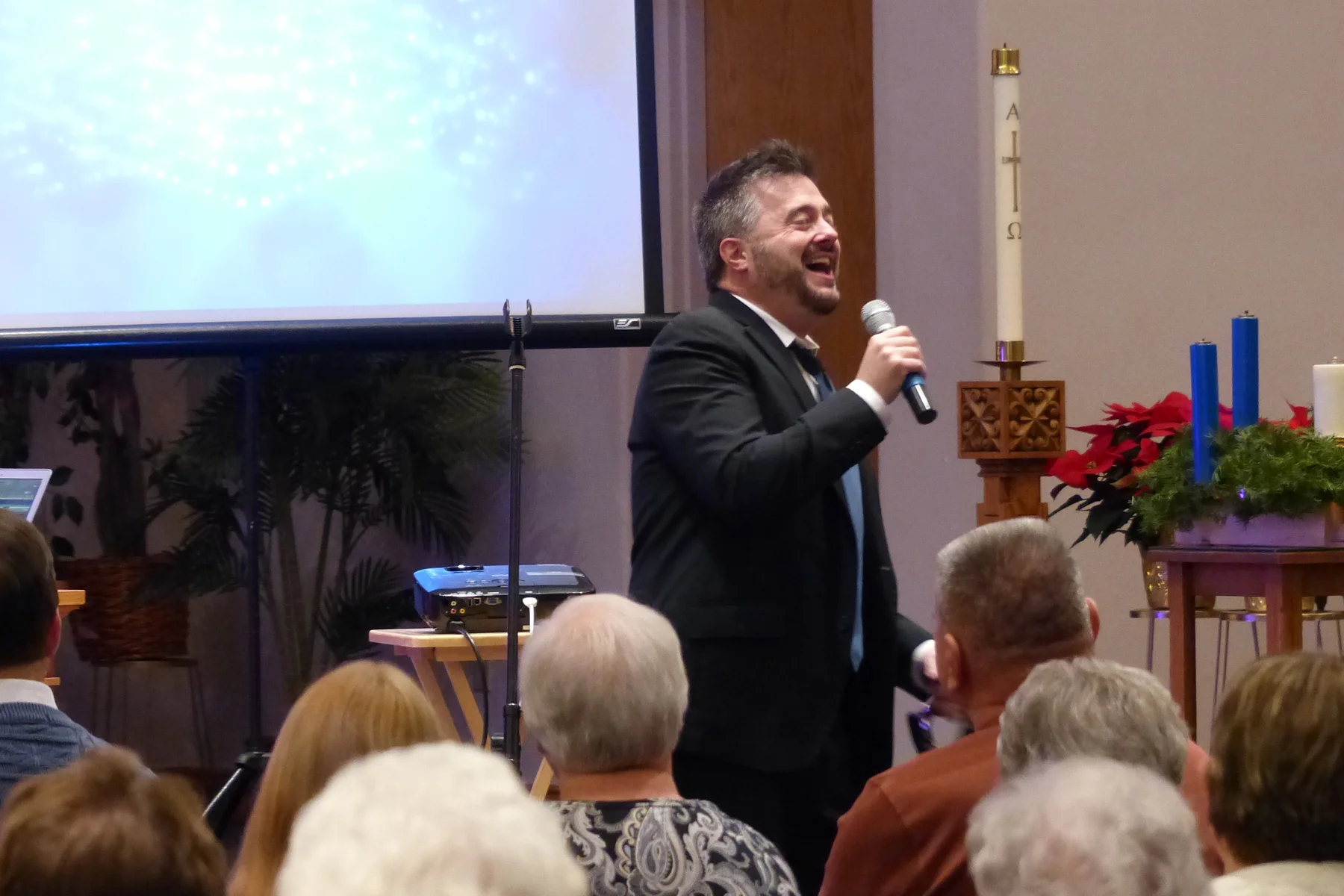 He sang traditional Christmas music, as well as some original tunes. 