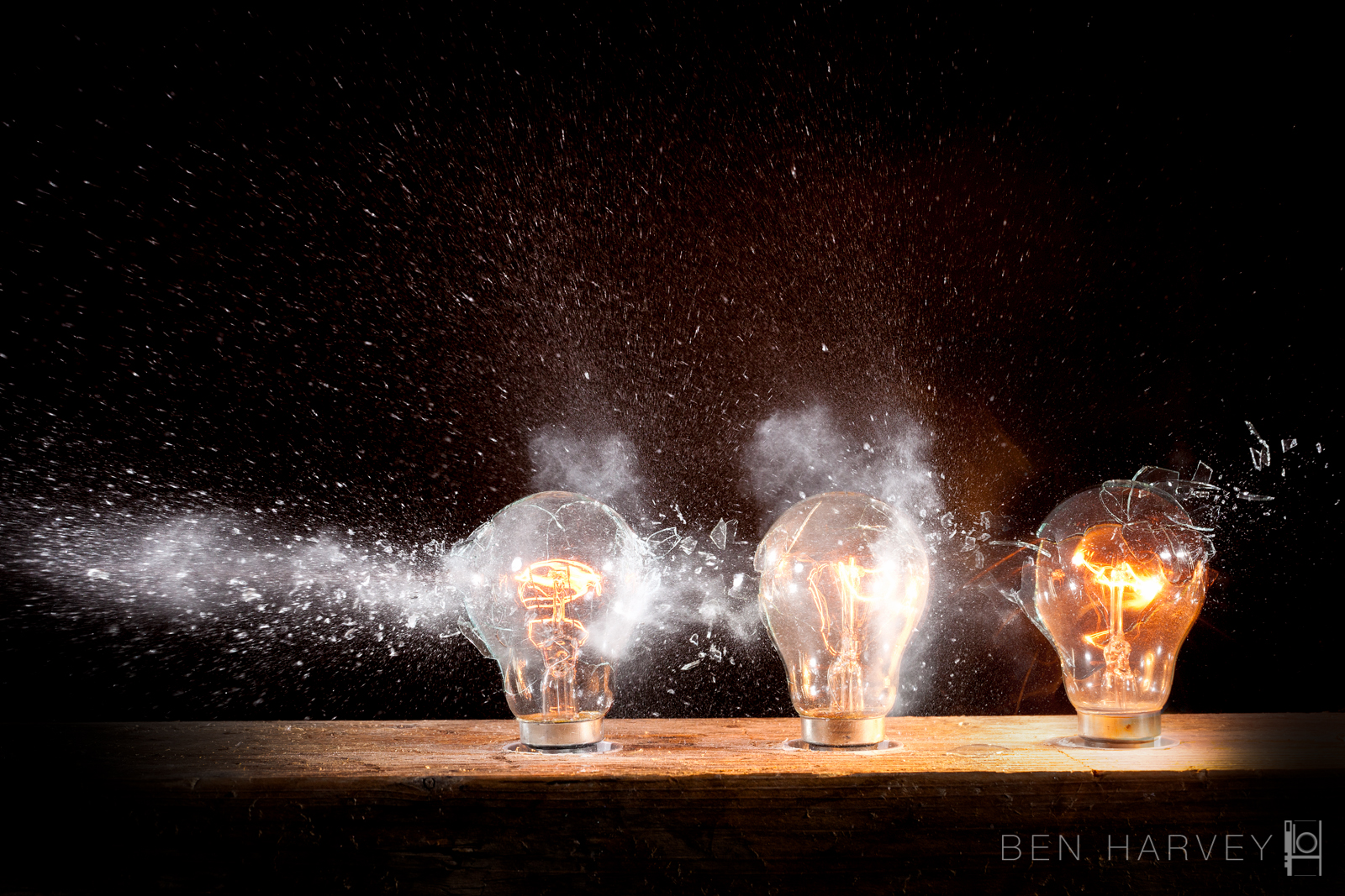 The moment a bullet passes through three light bulbs - all plugged into the mains