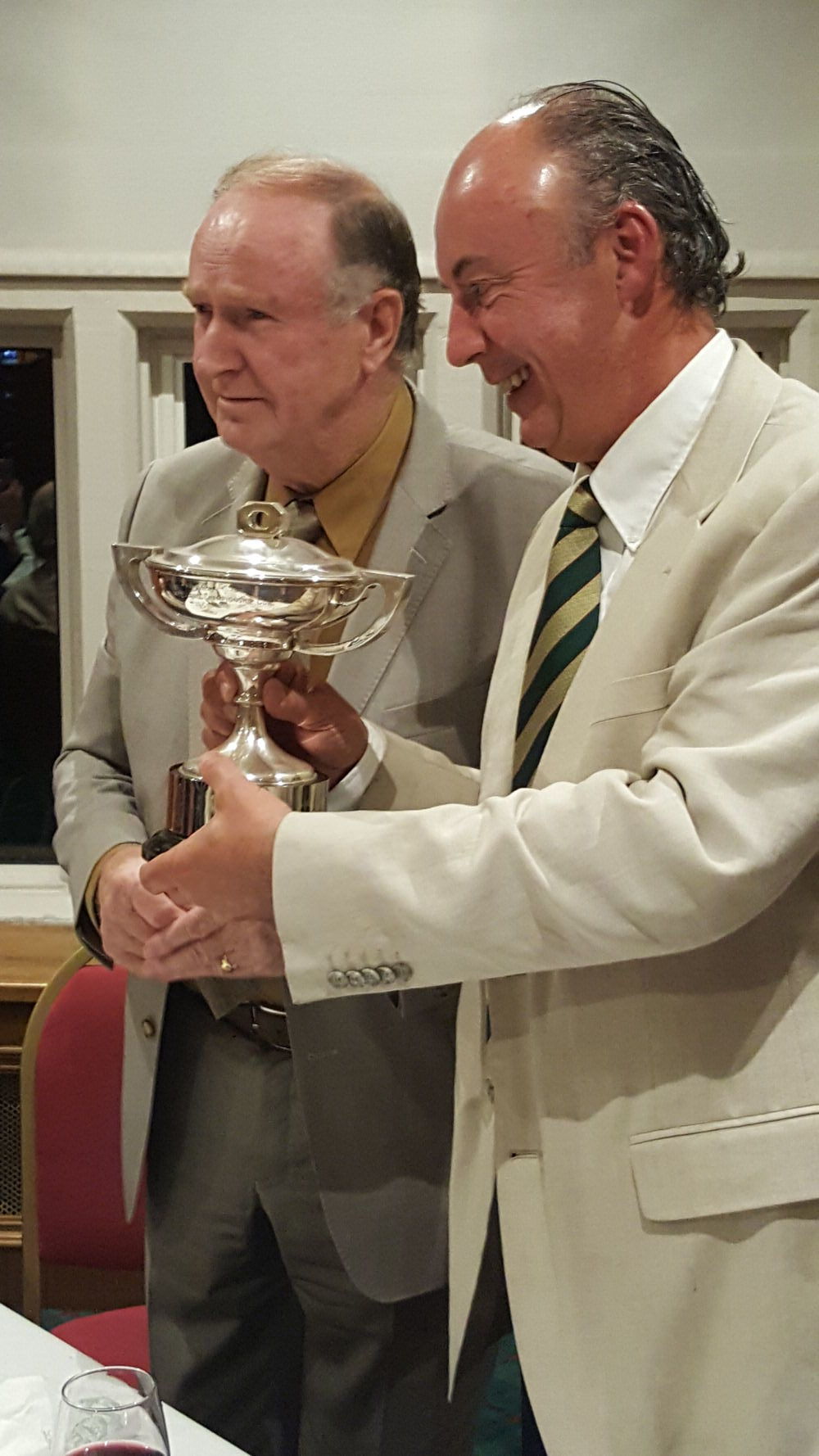 Dermot Gilleece, chairman of the IGWA, presents the Carr Cup to Dougie Heather of Portmarnock GC.