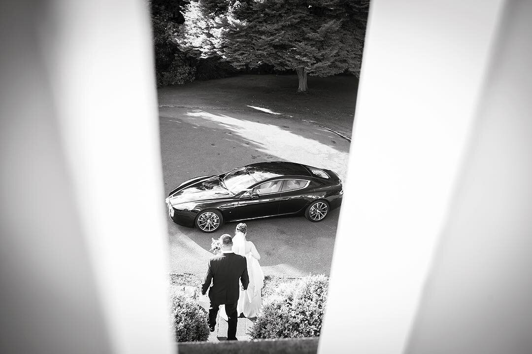 #weddingphotography by #uptownimaging grabbing every opportunity to snap the #bride and #groom. #weddinglocation #beautiful #wedding #love #astonmartin #chartridgelodge