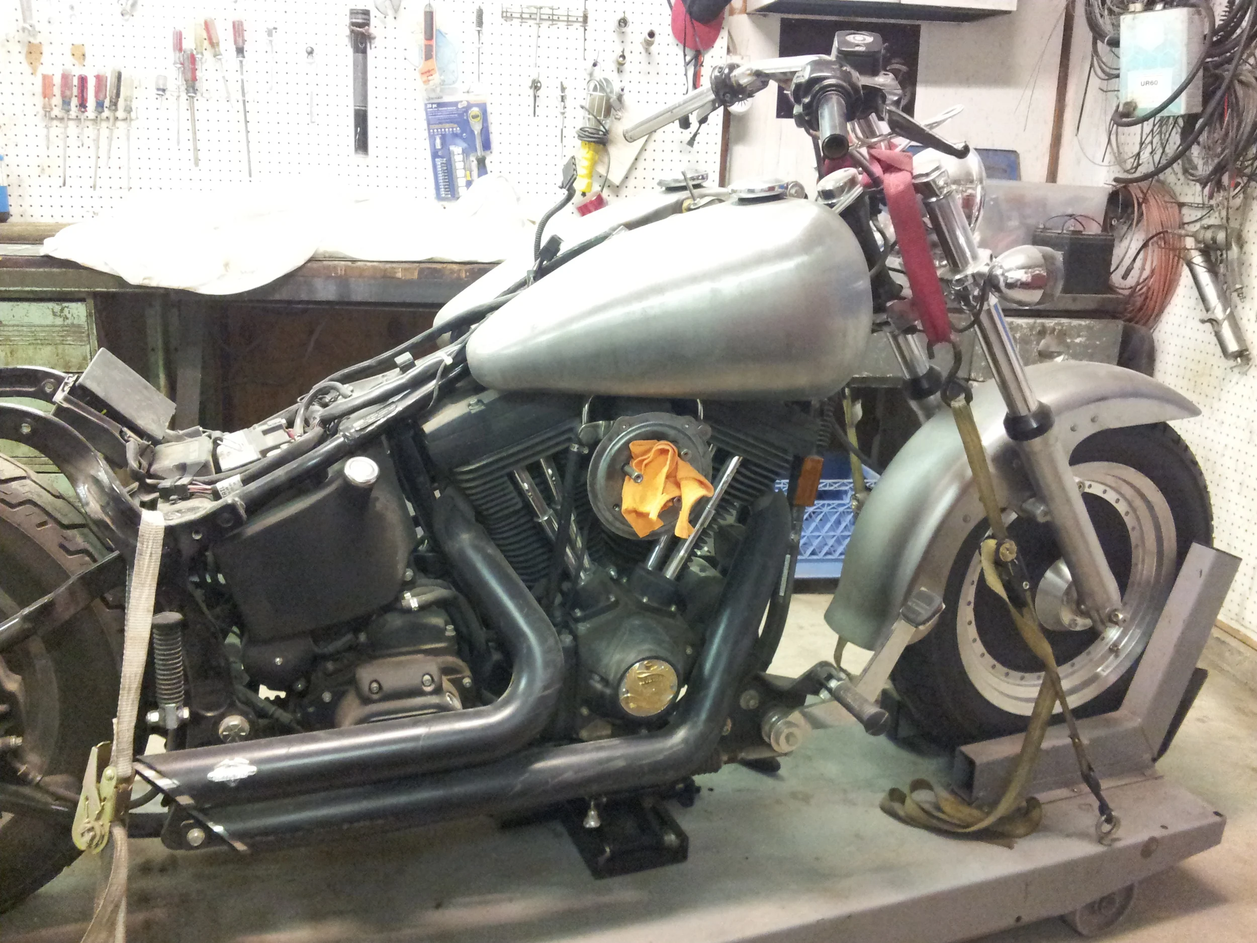 The mototrcycle used is a 1999 Harley Davidson FXSTB