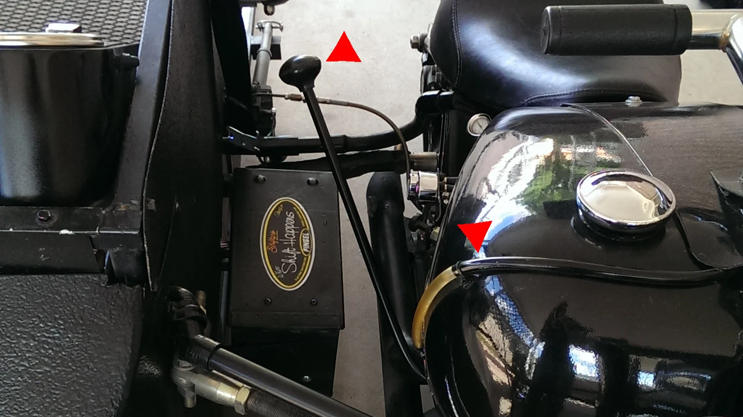 A manual shifter by B&B was installed just in case the electronic shifter fails. Also, a clear fuel line was connected between the vent on top of the tank and the fuel line that connects the 2 tanks to act as a fuel gauge.