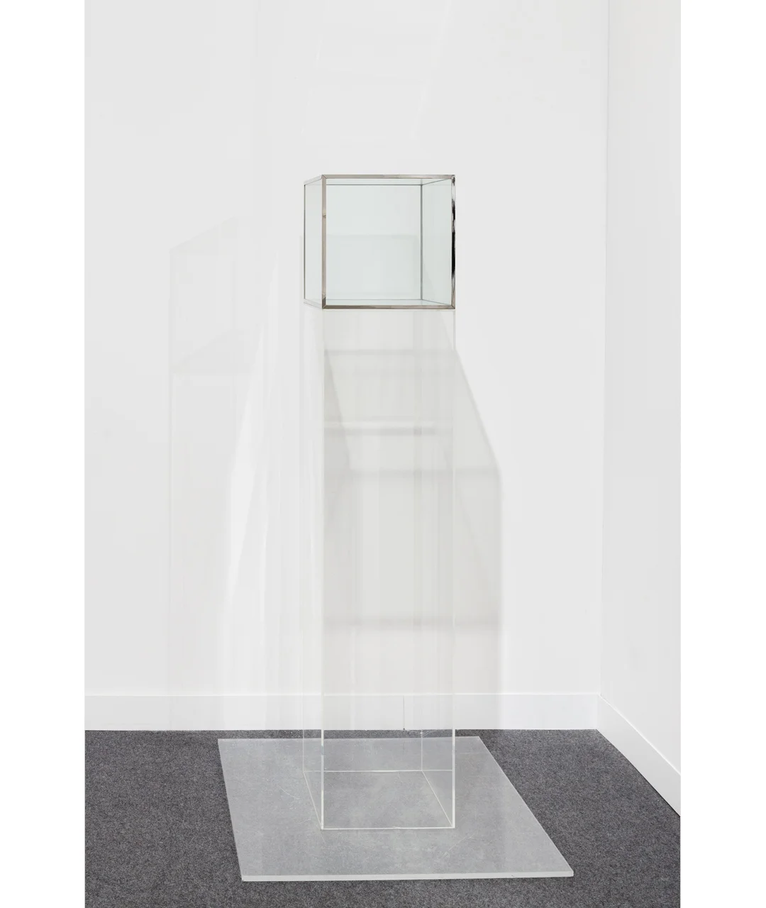 Larry Bell Untitled , c. 1968 Glass cube with metal seams cube: 12 x 12 x 12 inches (30.5 x 30.5 x 30.5 cm) pedestal: 48 x 12 x 12 inches (122 x 30.5 x 30.5 cm)