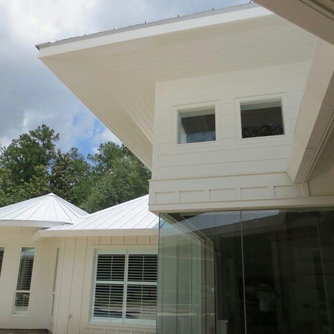 Pamela Bordelon, NCIDQ design project in 'Louisiana Horse Country', a Modern Farmhouse in Folsom, Louisiana built for our clients entertaining lifestyle. Outside photo of (1) Master Bedroom turret comprising of a (2) intimate sitting area, (3) Master