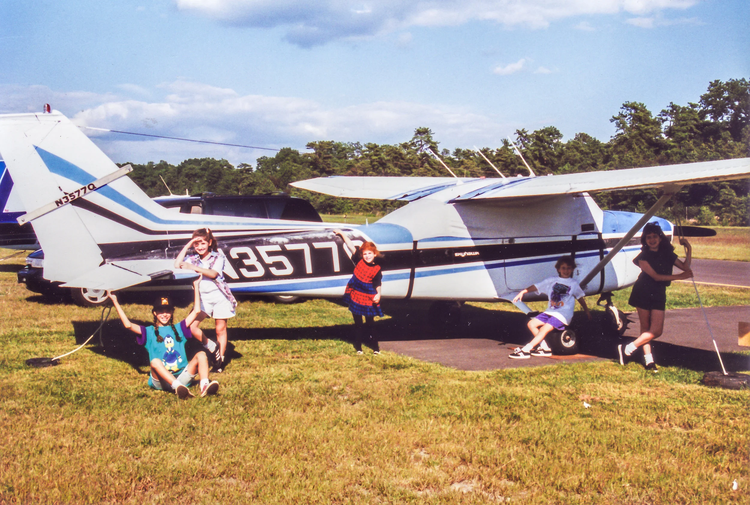Here's my Cessna 172 Skyhawk with my daughters Amy (turquoise), and Emily (red) and some of their friends.