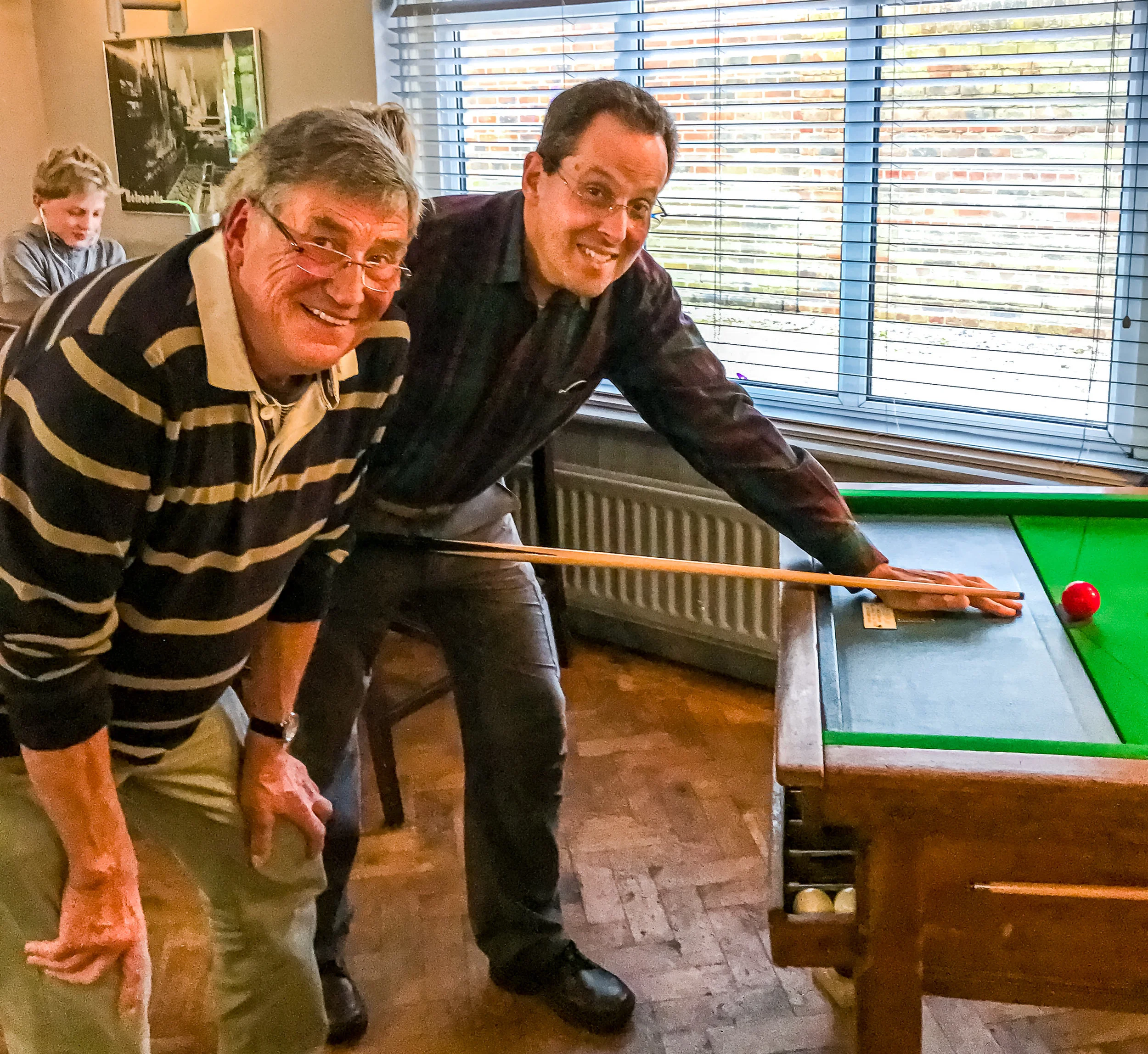 My mate Colin and me playing Bar Billiards after dinner at The Seaview .