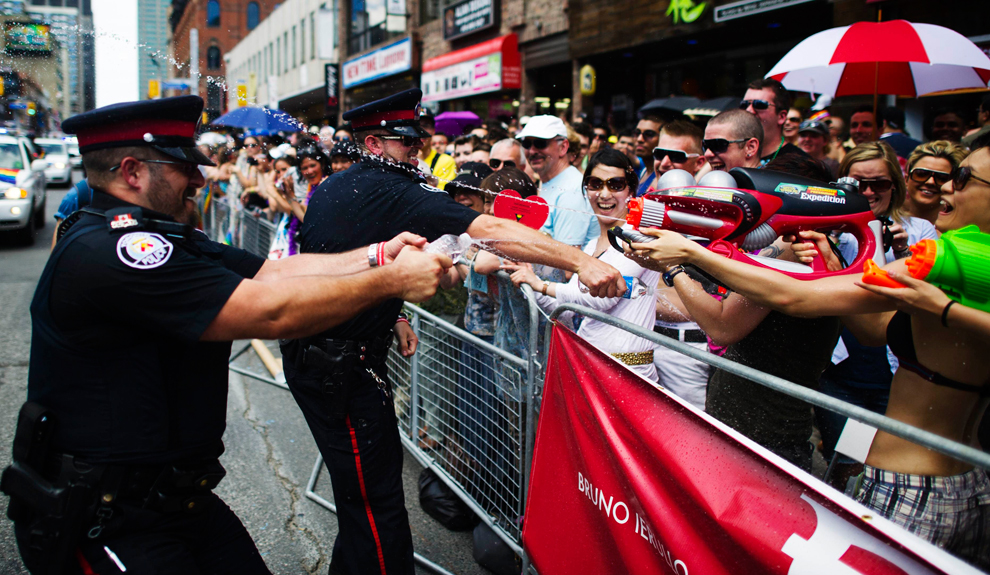 Toronto cops laying down withering fire at the Gay Pride Parade. No wonder Black Lives Matter wants them out.