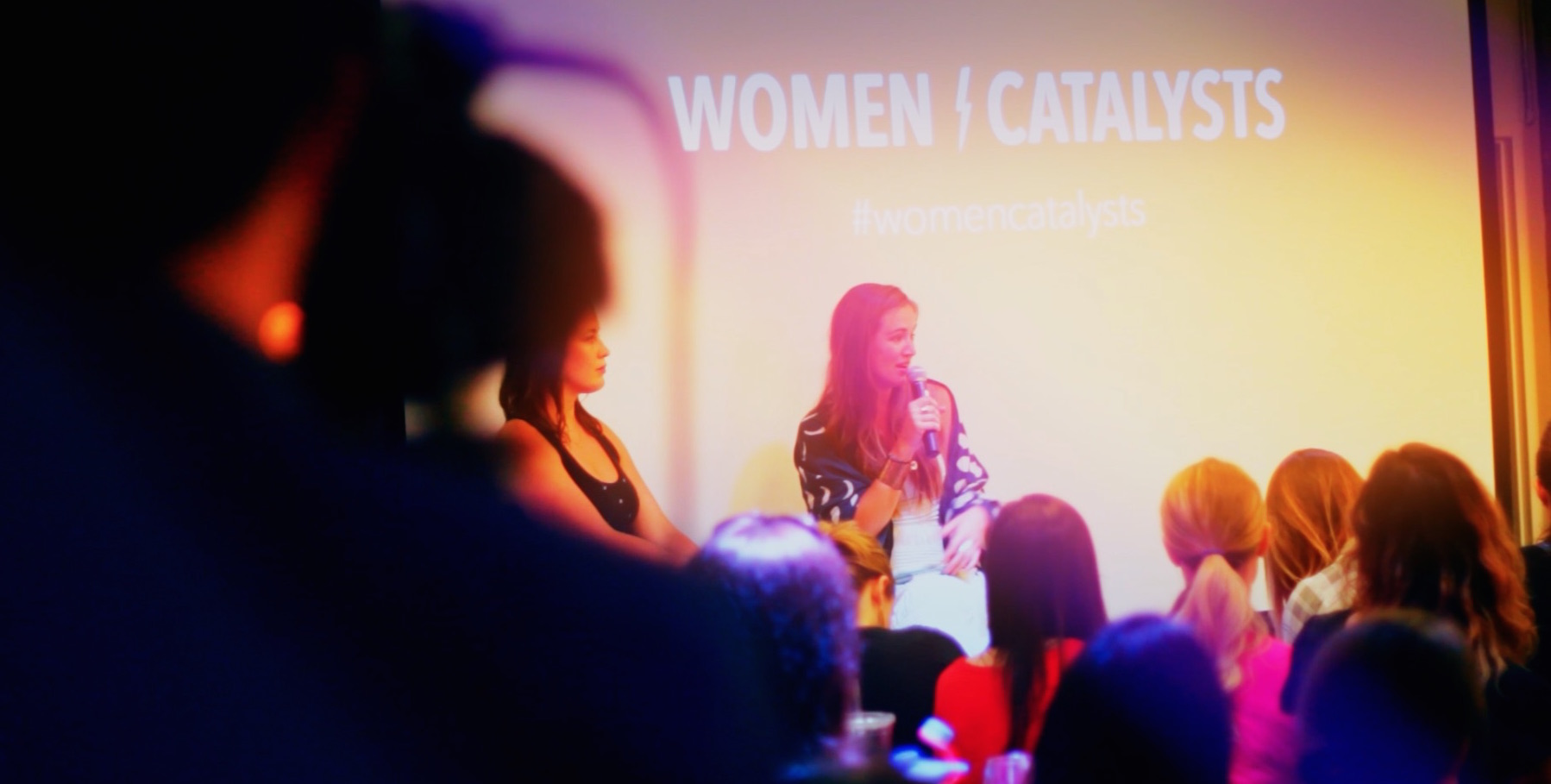 Artist and writer Elle Luna presenting on the crossroads in should and must at Women Catalysts.