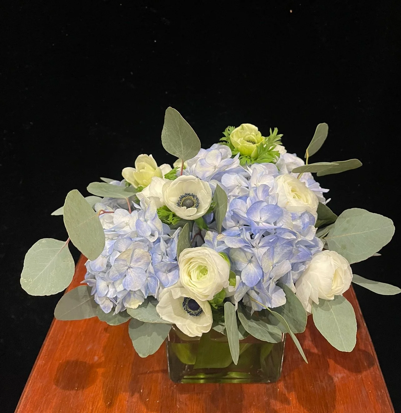 online- anemones-ranunculus-rustic-hydrangeas-eucalyptus.jpeg