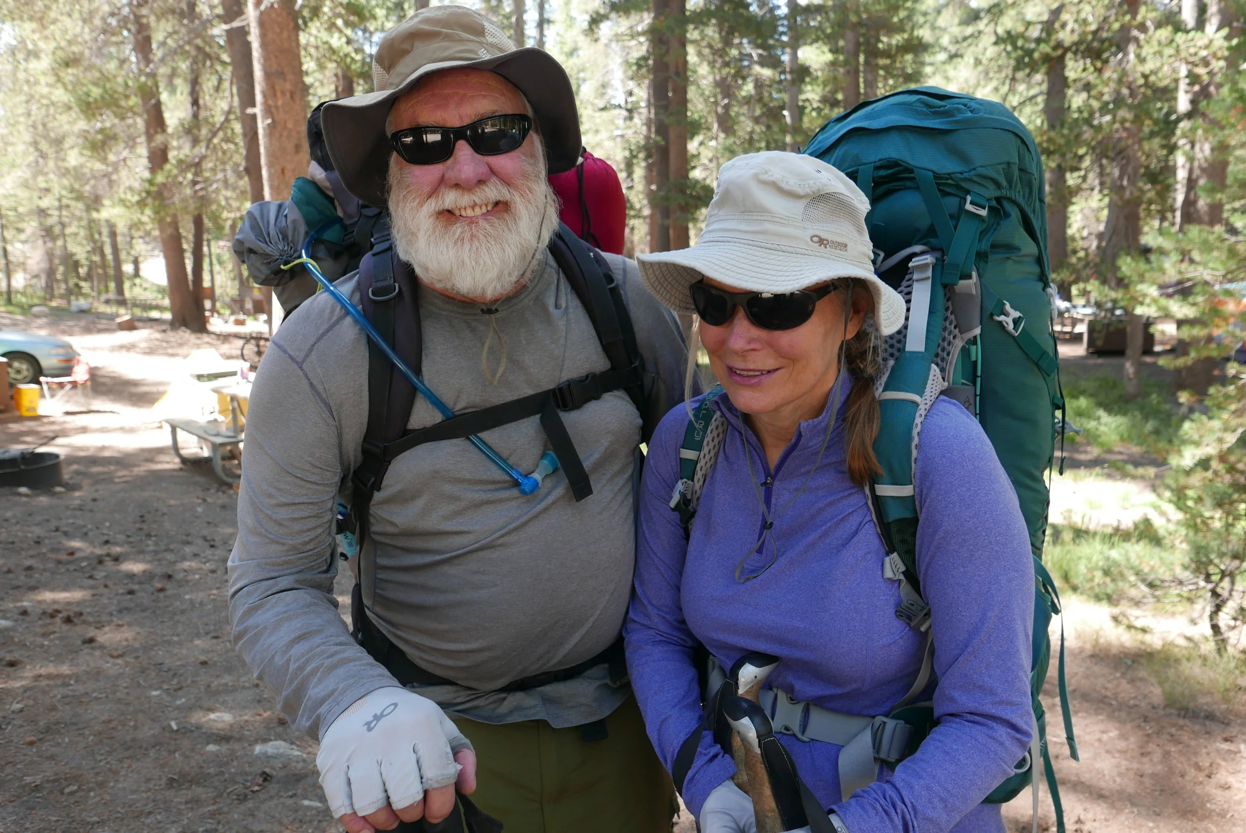 Backpackers Tom and Diane Waters head out on a 100 mile hike, part of their plan to cover the length of the John Muir Trail. Photo Credit: Gregg McVicar
