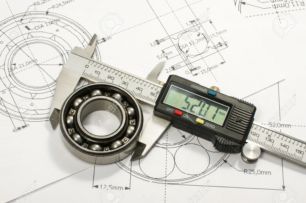 50325768-Bearing-and-caliper-on-the-mechanical-engineering-drawing-Stock-Photo.jpg