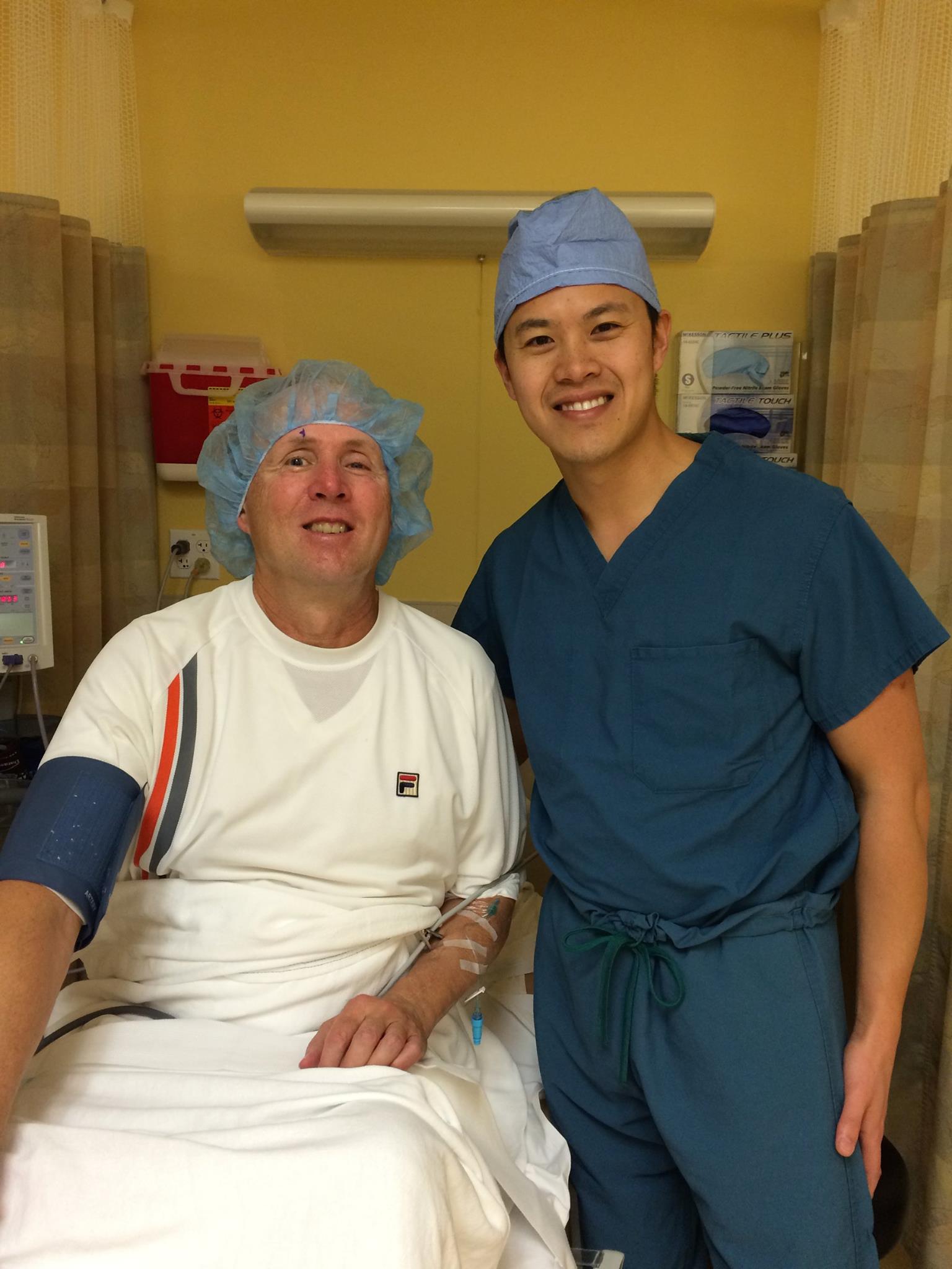 Dr. Kevin Tan with patient after a successful cataract surgery