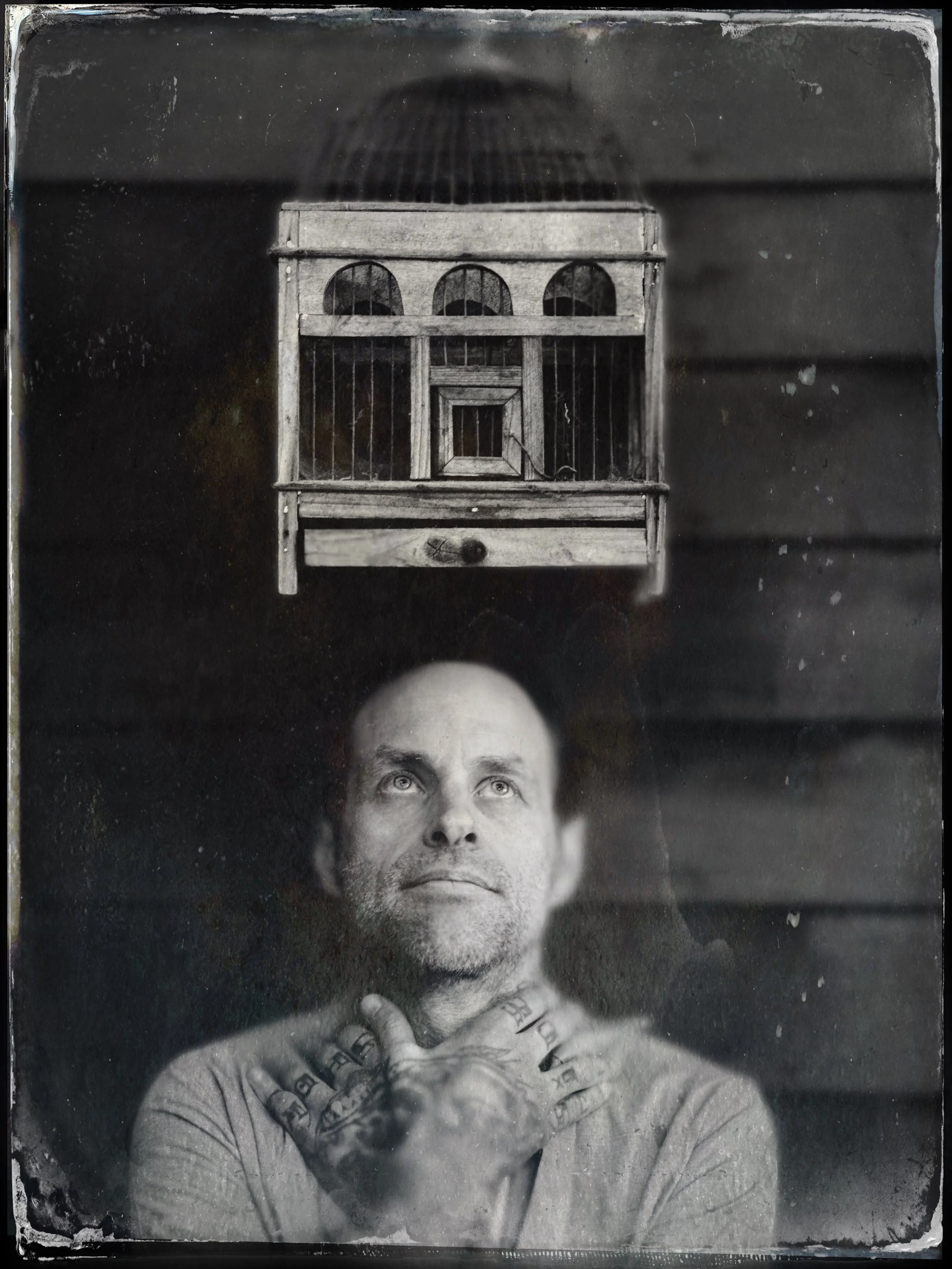 Portrait Photo of Jeffery Page Avant Garde Provocateur Los Angeles Artist by world famous Punk Rock Photographer Ed Colver in highland park with Birdcage