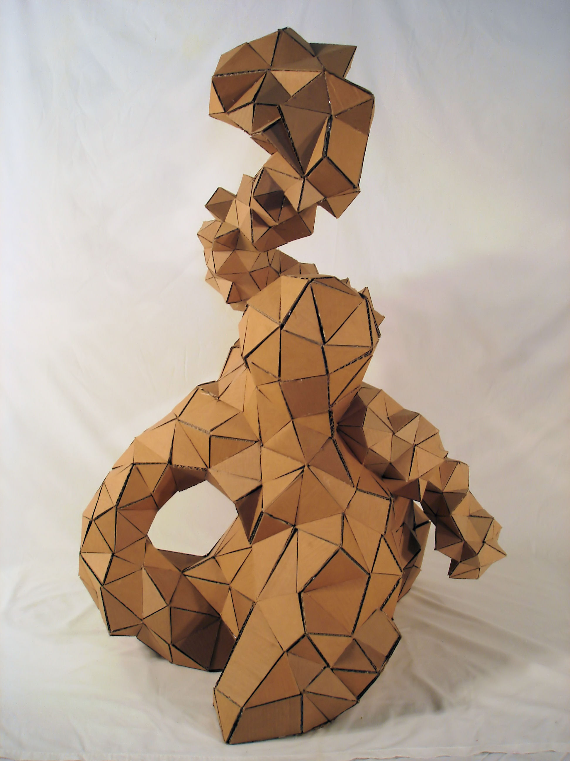  "Vibrato"  newspaper, cardboard, glue  48" x 28" x 30"  2006 