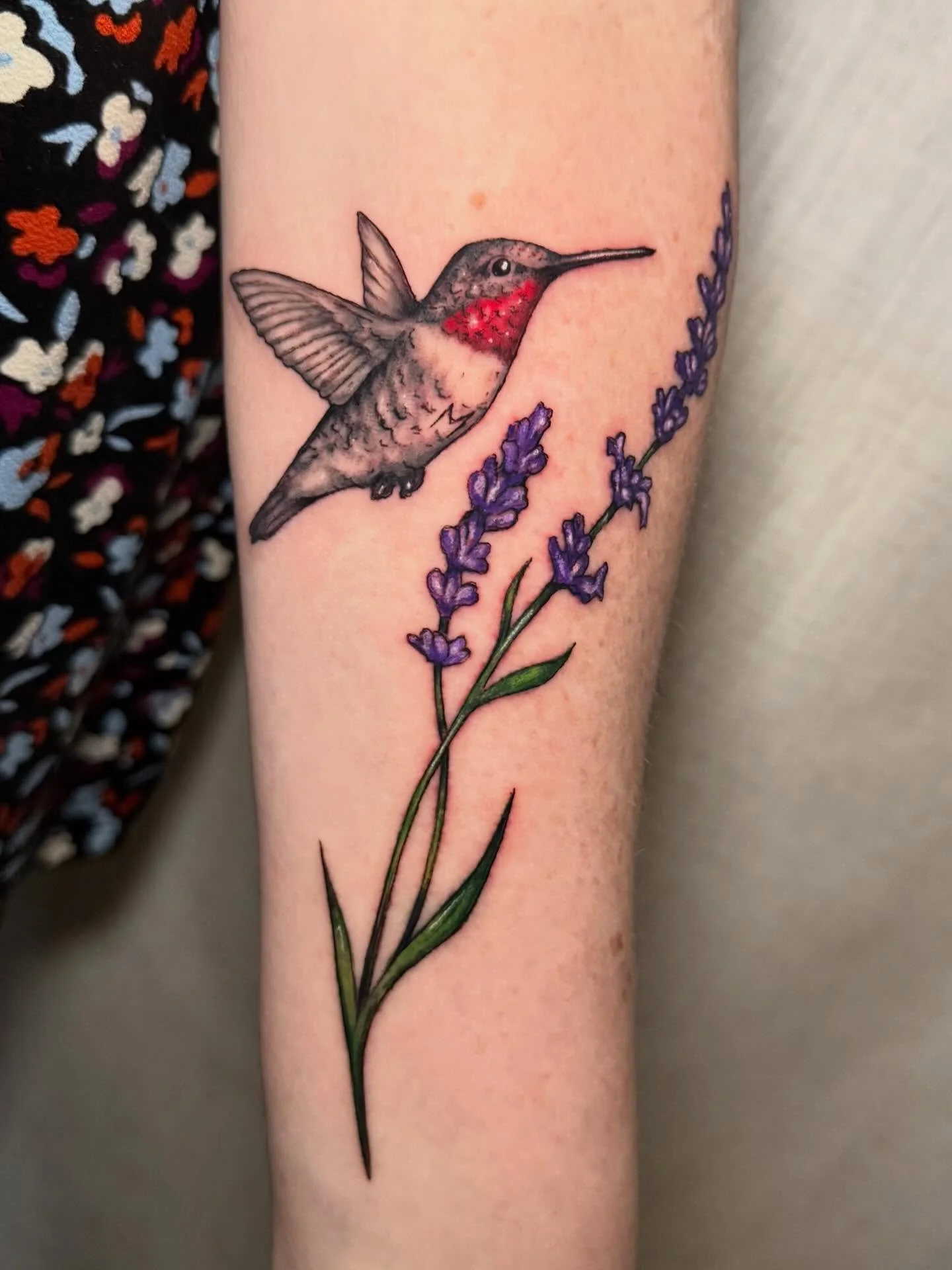 Really happy with the flow of this simple hummingbird and lavender tattoo on the forearm.