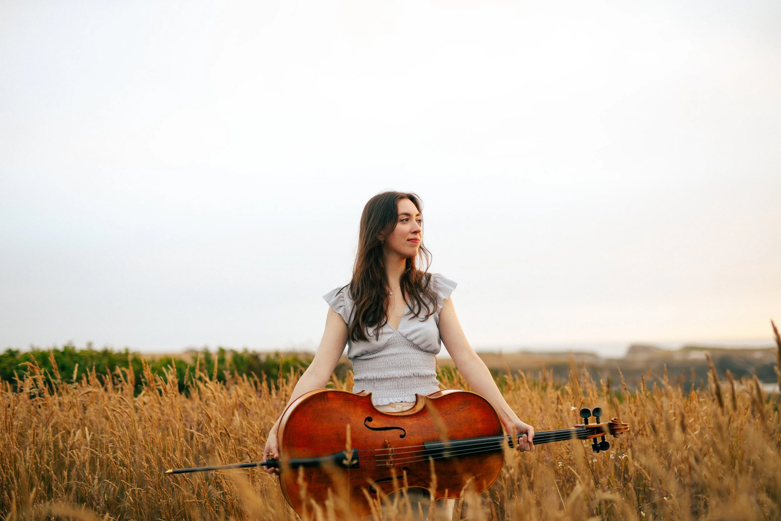 cellist portrait in the headlands during golden hour