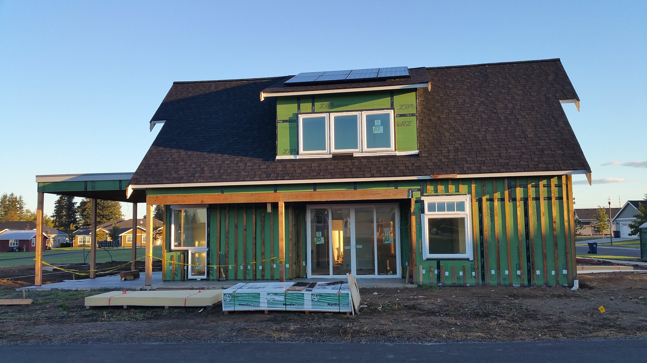 The south side of the residence with patios in place.