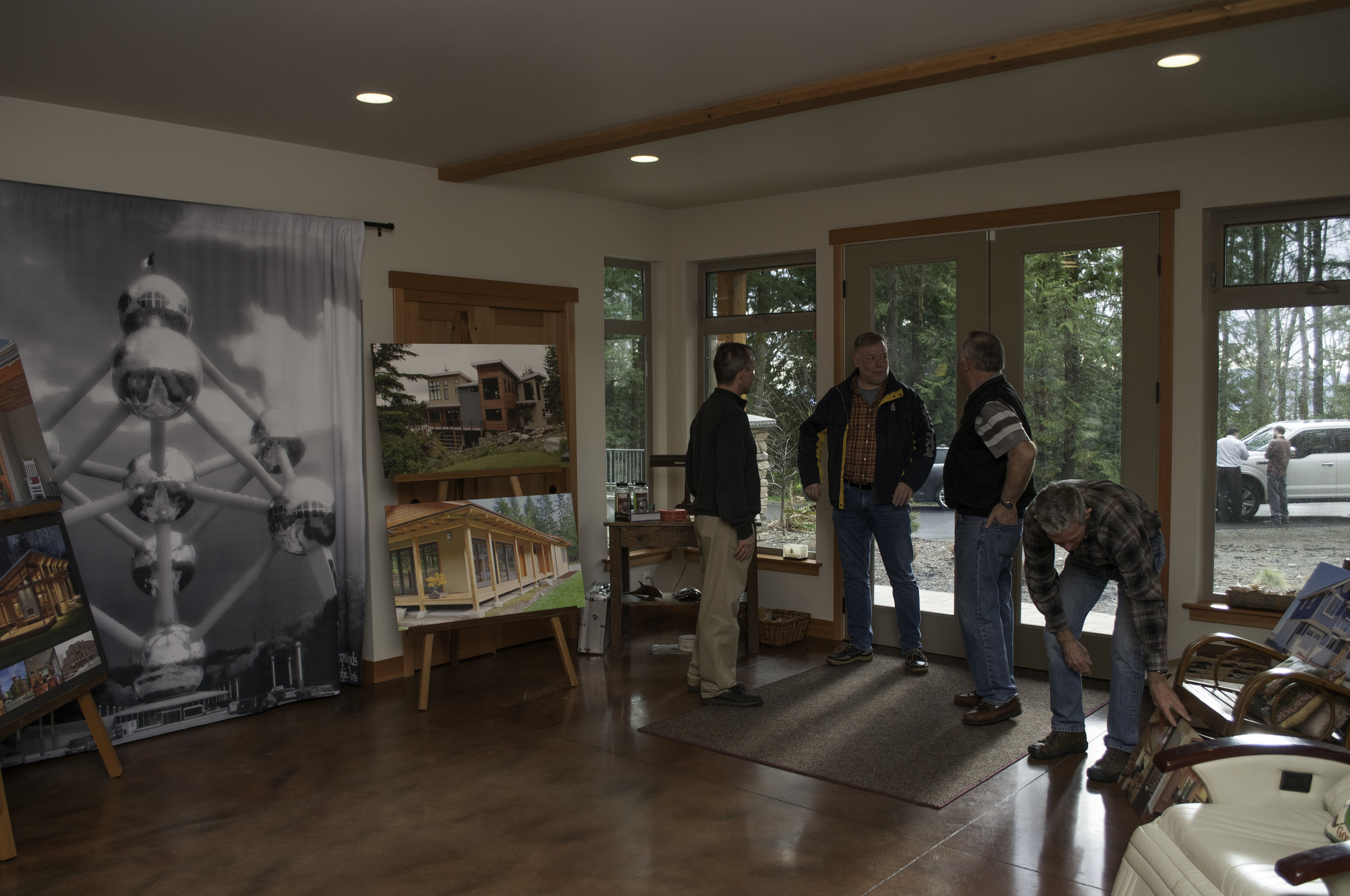The welcoming downstairs entrance that doubles as a workspace for the homeowner's photography business.