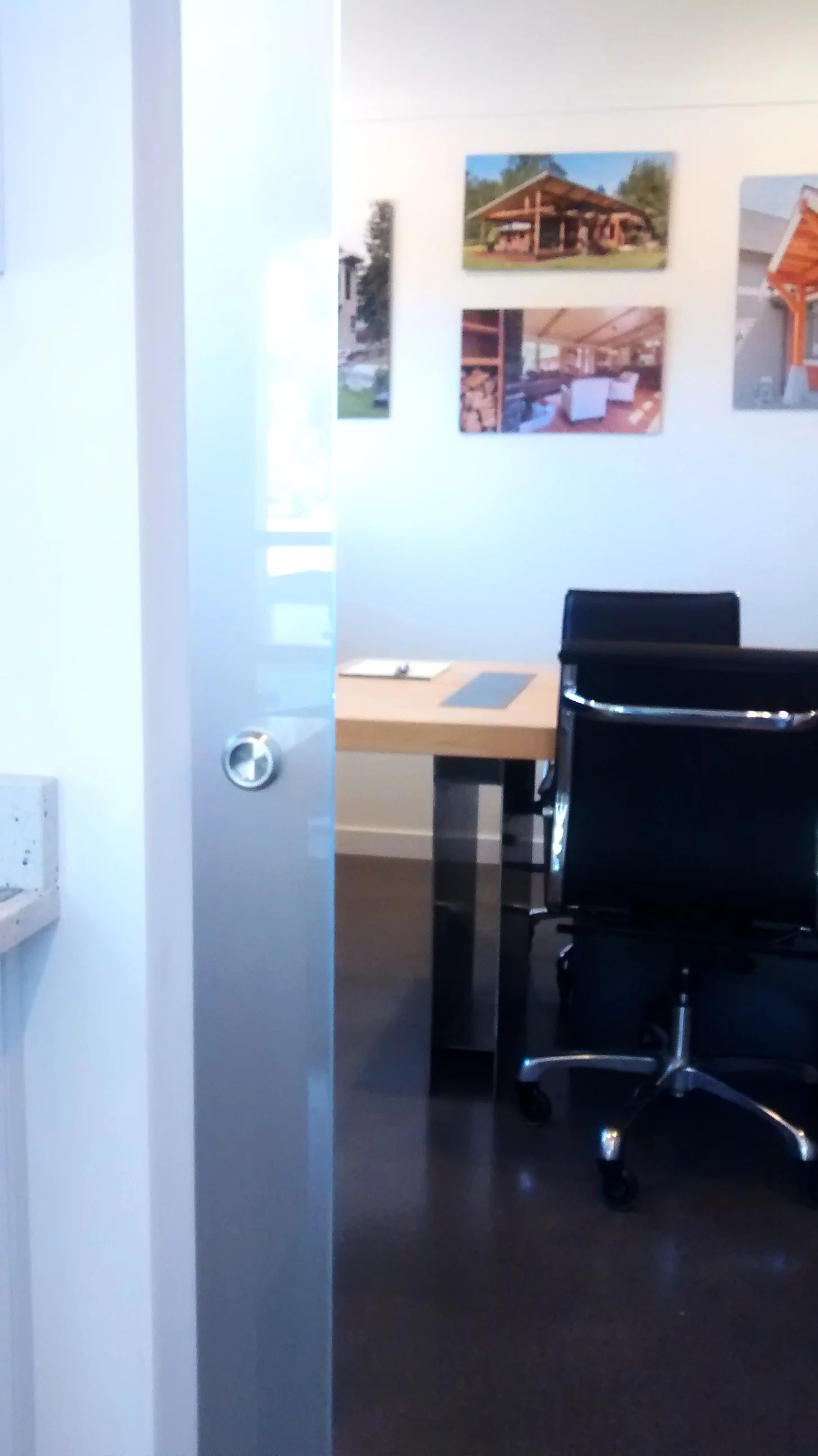 Finally a door to our conference room! Sean sprung for the premium low-iron glass so the edges look positively ethereal. 