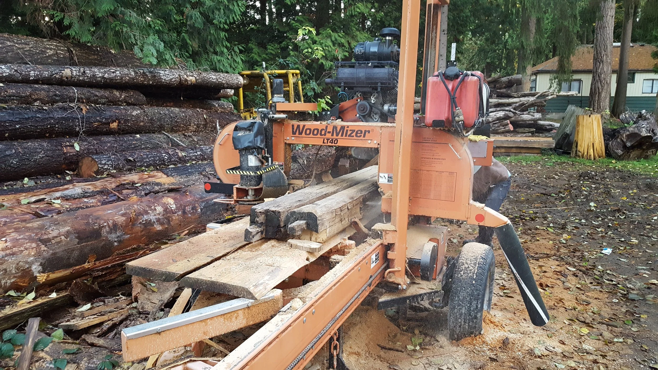 Behold the awesome power of the wood mizer. I want to have a reason to have one of these.