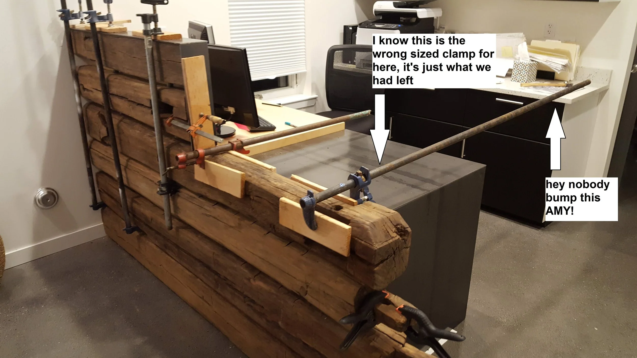 never enough clamps. Holding this while adhesive cures. please nobody try to walk around the desk or anything
