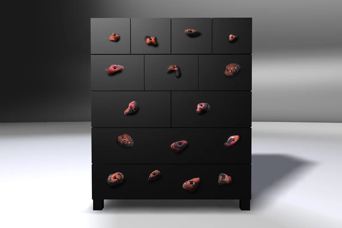  K2 is a chest of drawers using rock climbing holds as drawer pulls. 