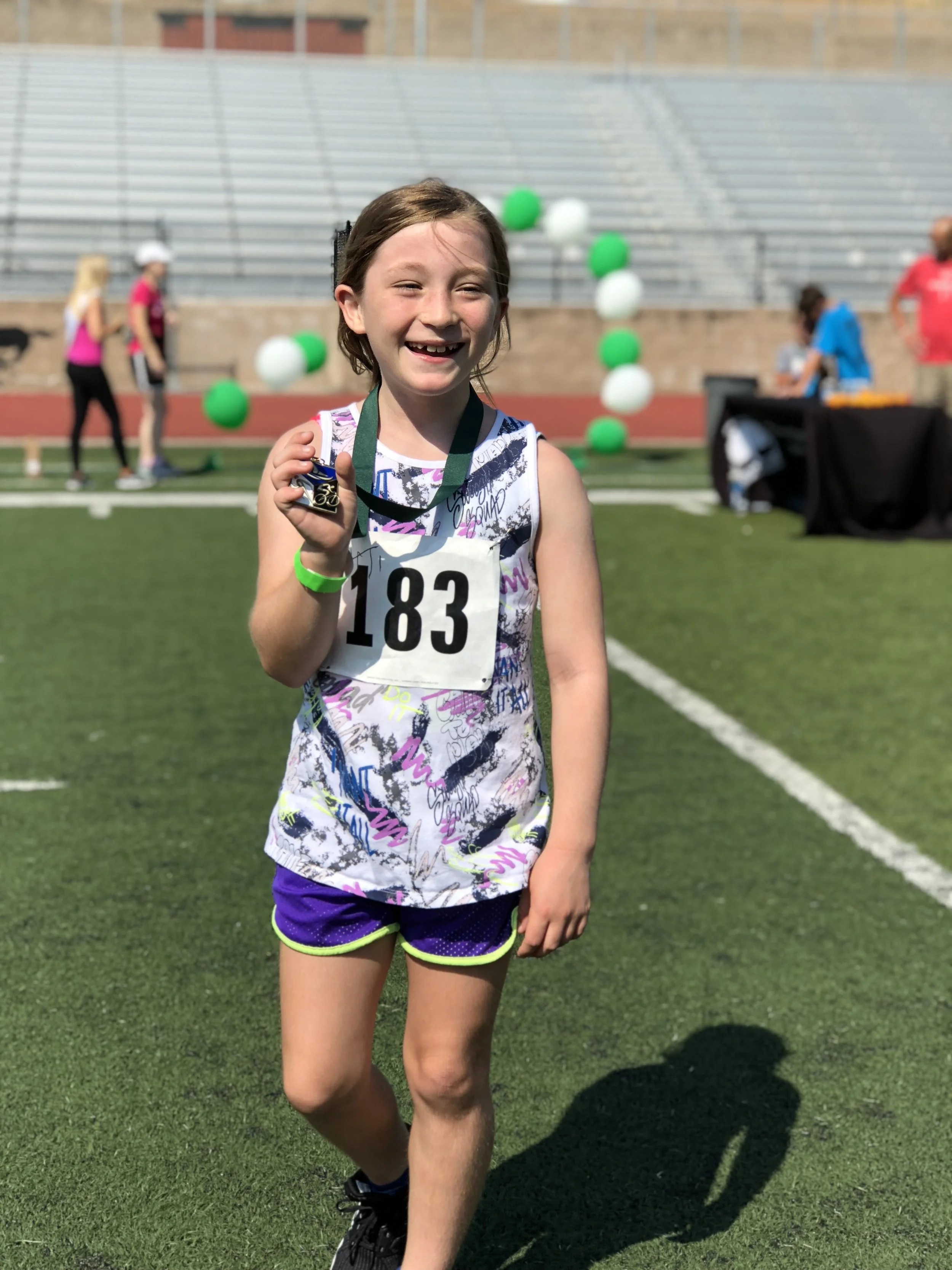 Grace (age 9) becoming a triathlete