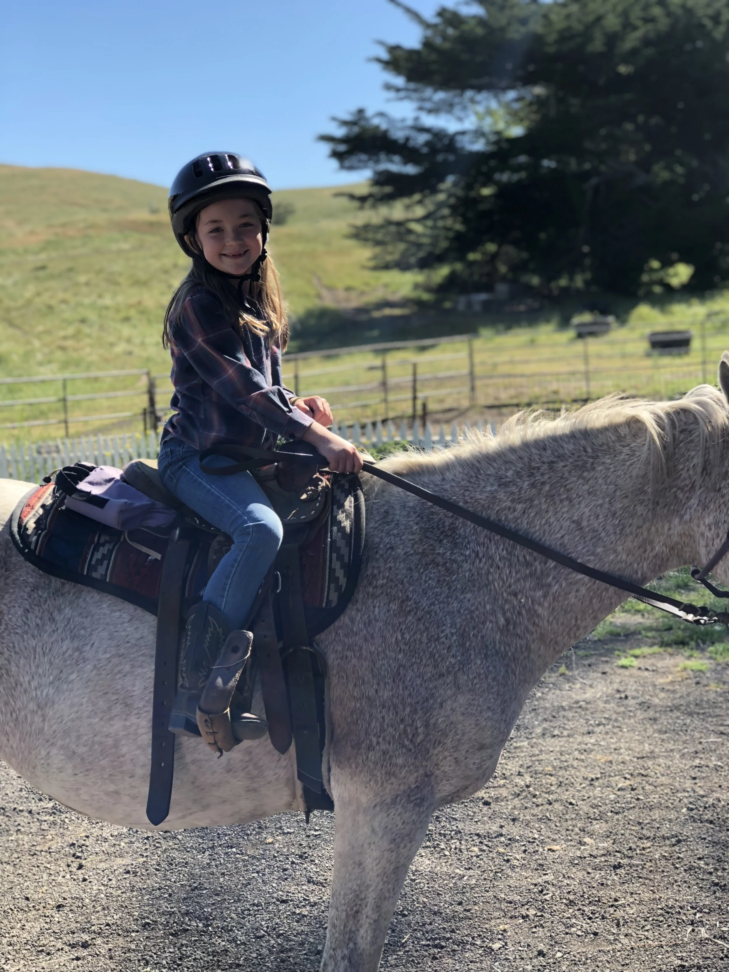 Amy (age 7) heading out on a birthday trail ride