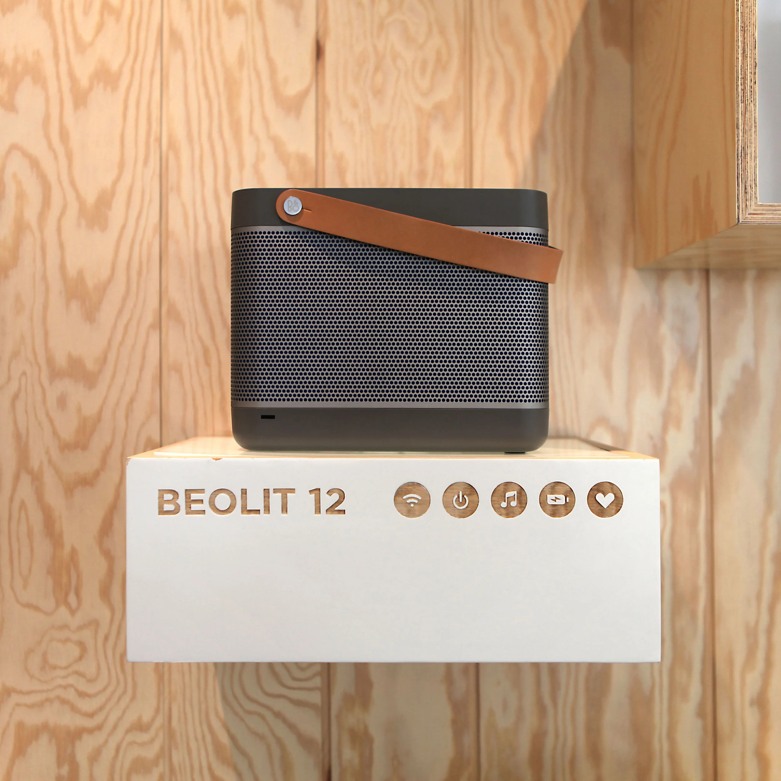 BEOLIT 12 product displayed in a B&O store designed by the shop-in-shop concept of Johannes Torpe Studios