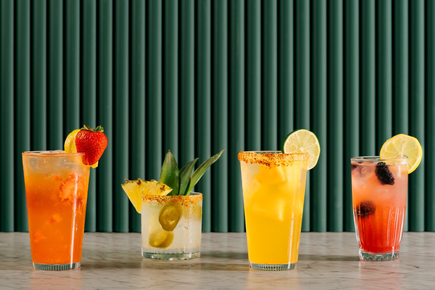 Lineup of Tropical Cocktails - Ted's Bulletin