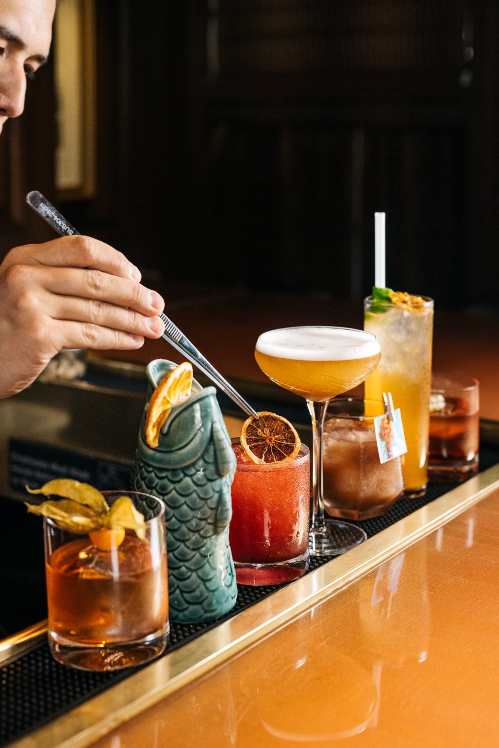 Bartender with Cocktails - The Quill