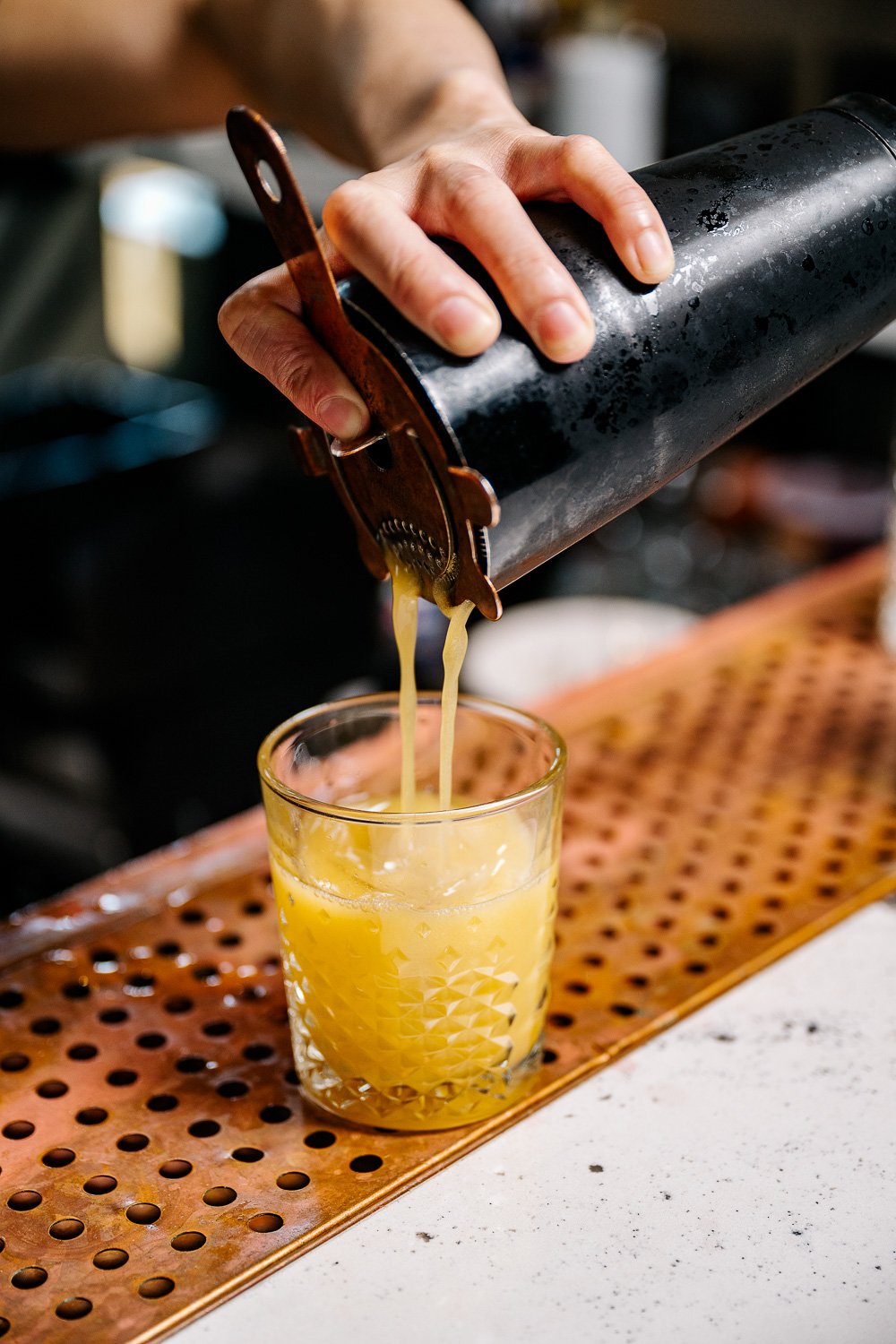 Bartender Pouring Cocktail - Smoke & Mirrors