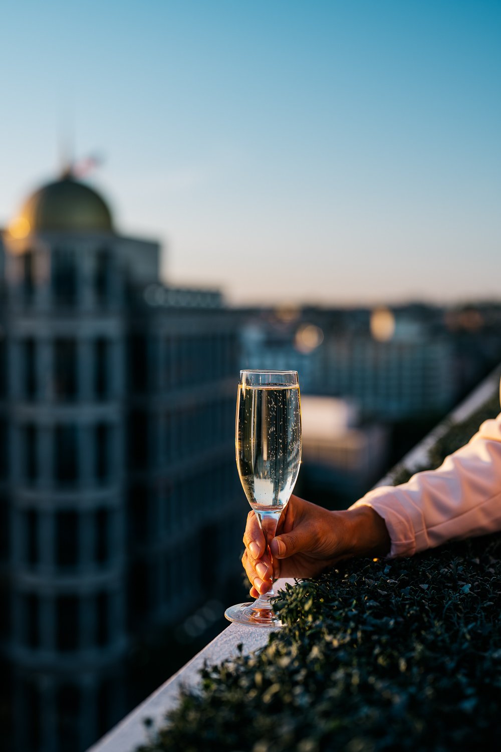 Sparkling wine on the penthouse balcony - Madison Hotel