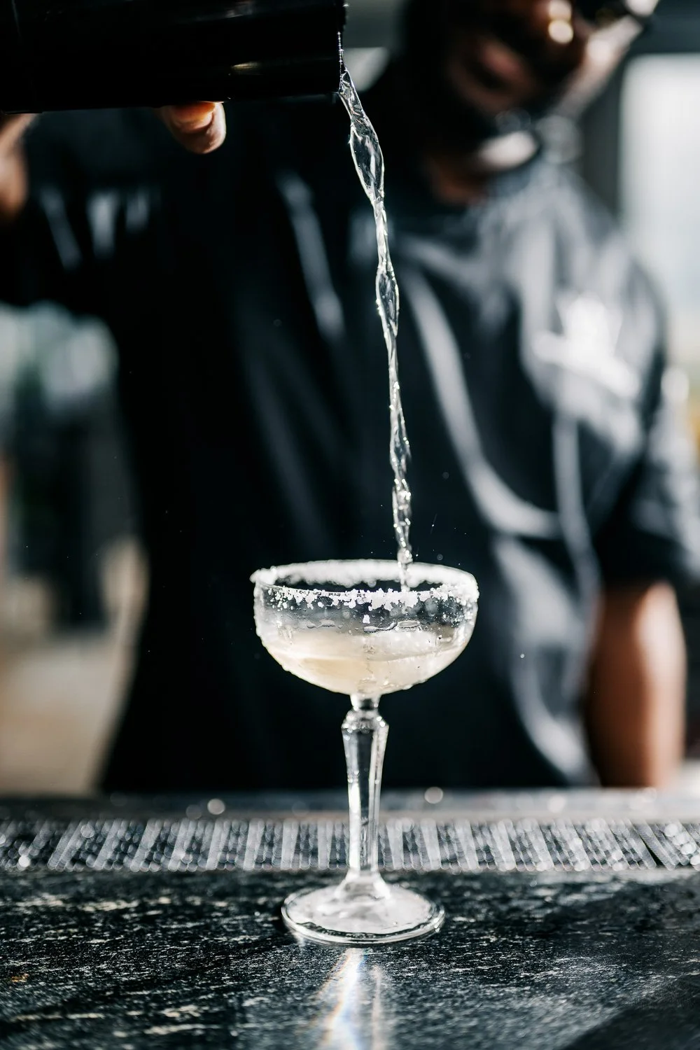 Bartender Pouring A Cocktail - Whiskey Charlie