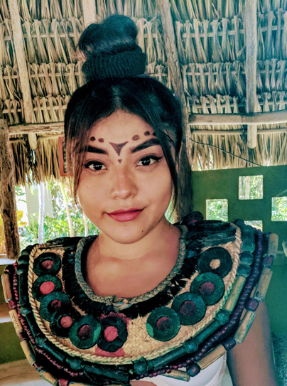 Mayan girls decorate their faces with traditional tattoos.