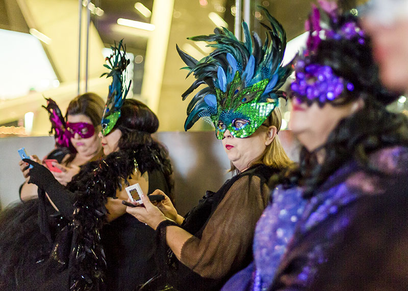  Several guests look on as others dance and mingle during the Arthritis Bone Bash Benefit at the Perot Museum of Nature and Science 