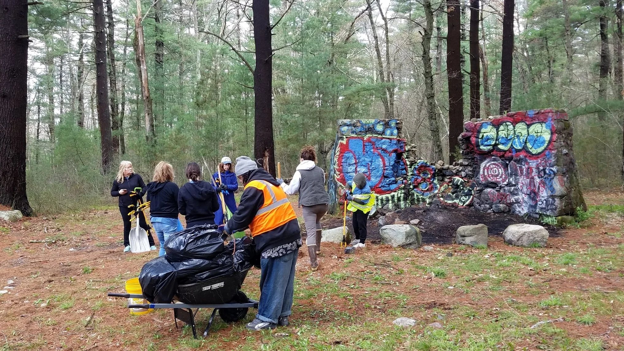 Volunteers wrap-up after spending three hours cleaning the properties.