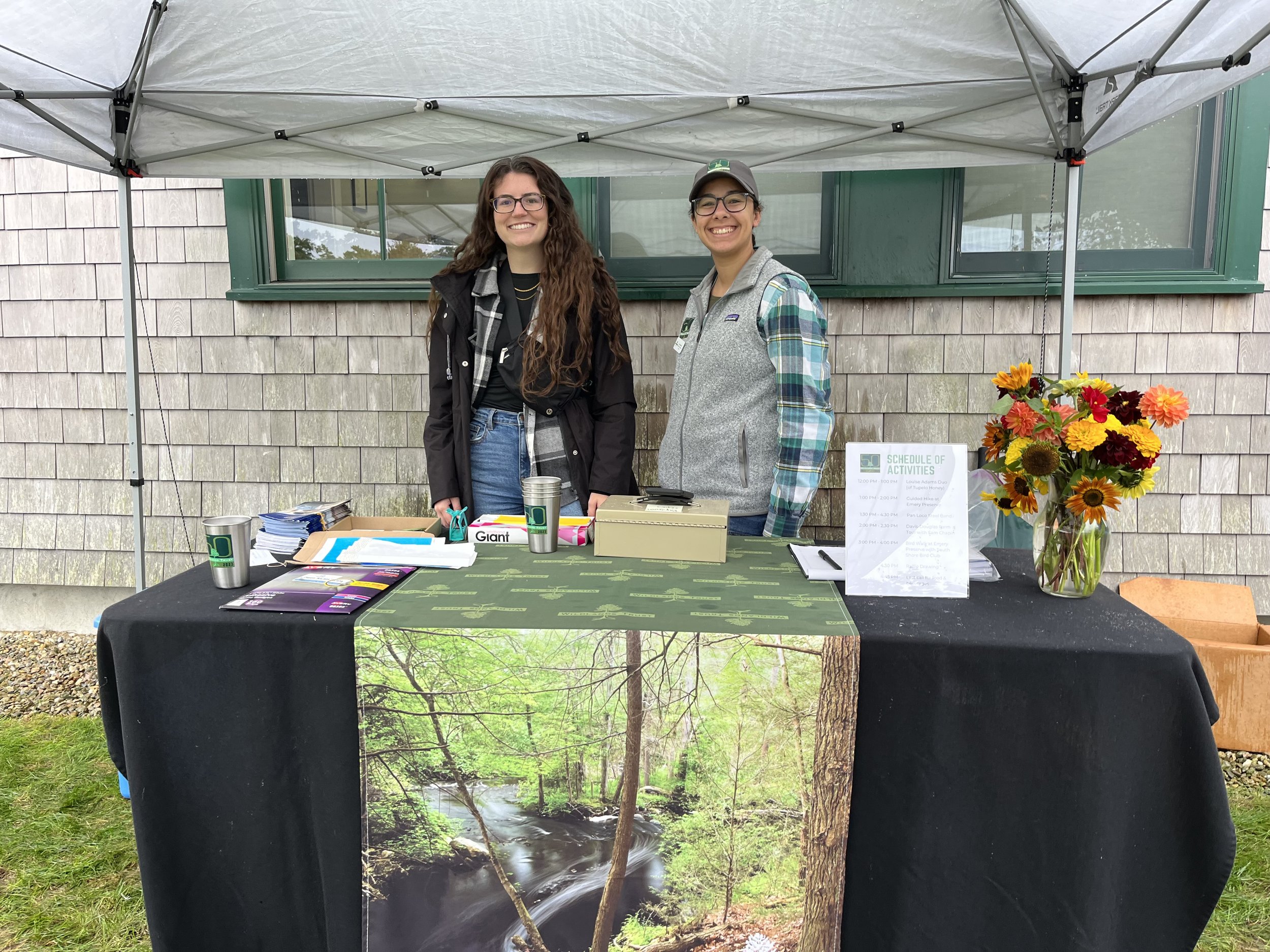 Welcoming faces at the registration table.