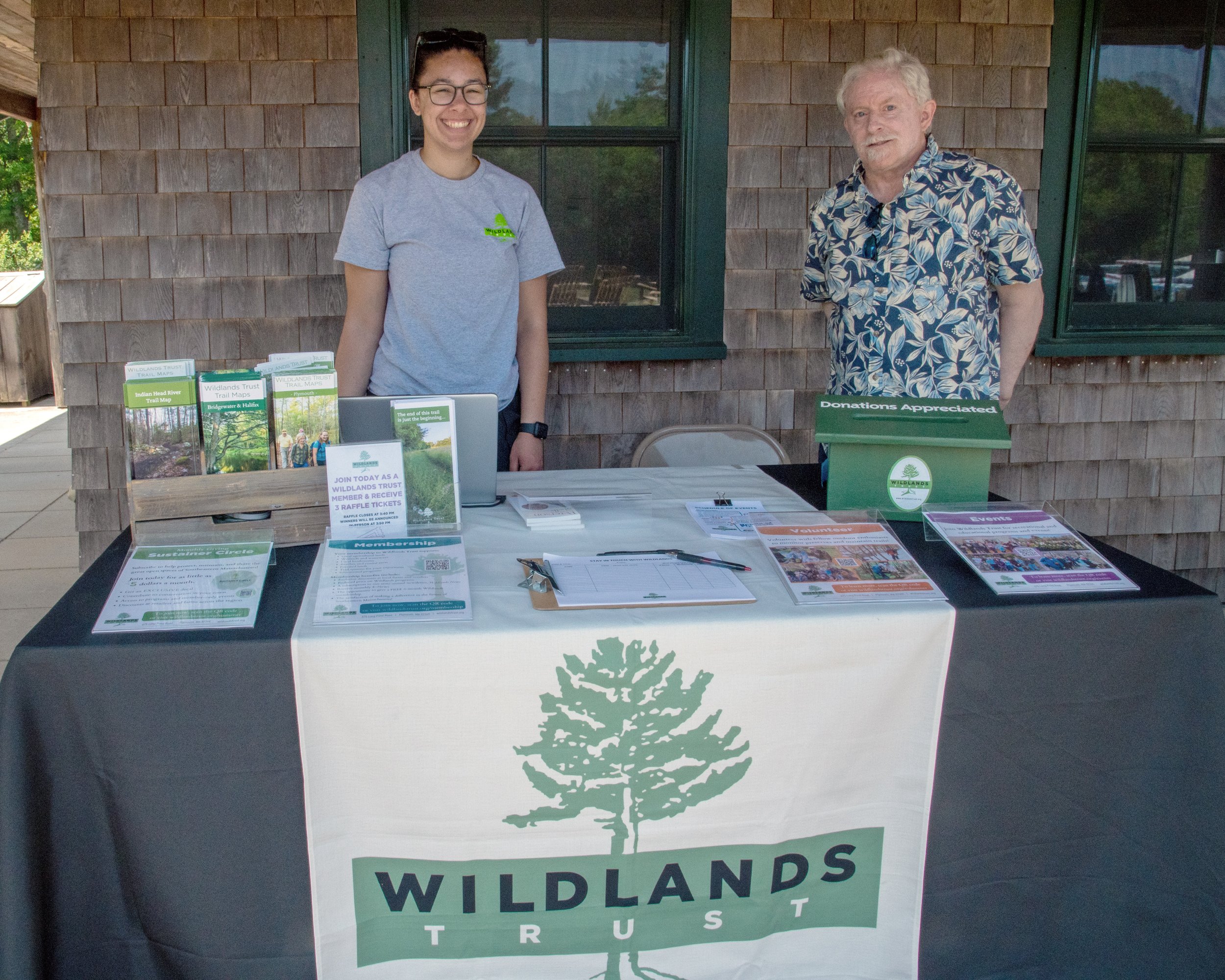 Kyla Isakson and Scott MacFaden at the welcome table