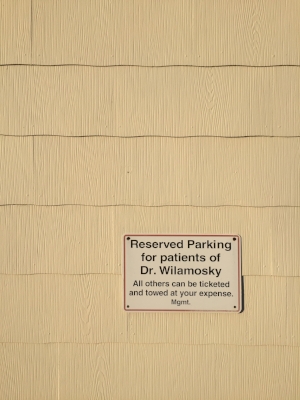 You may park at the side of the building at the reserved spots (you can use spots for patients of Dr. Wilamosky).