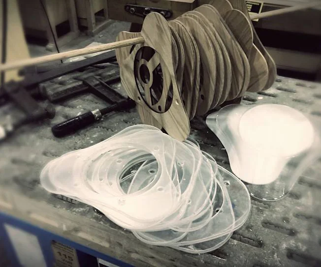 Building the lamp shade out of laser-cut acrylic and wood.