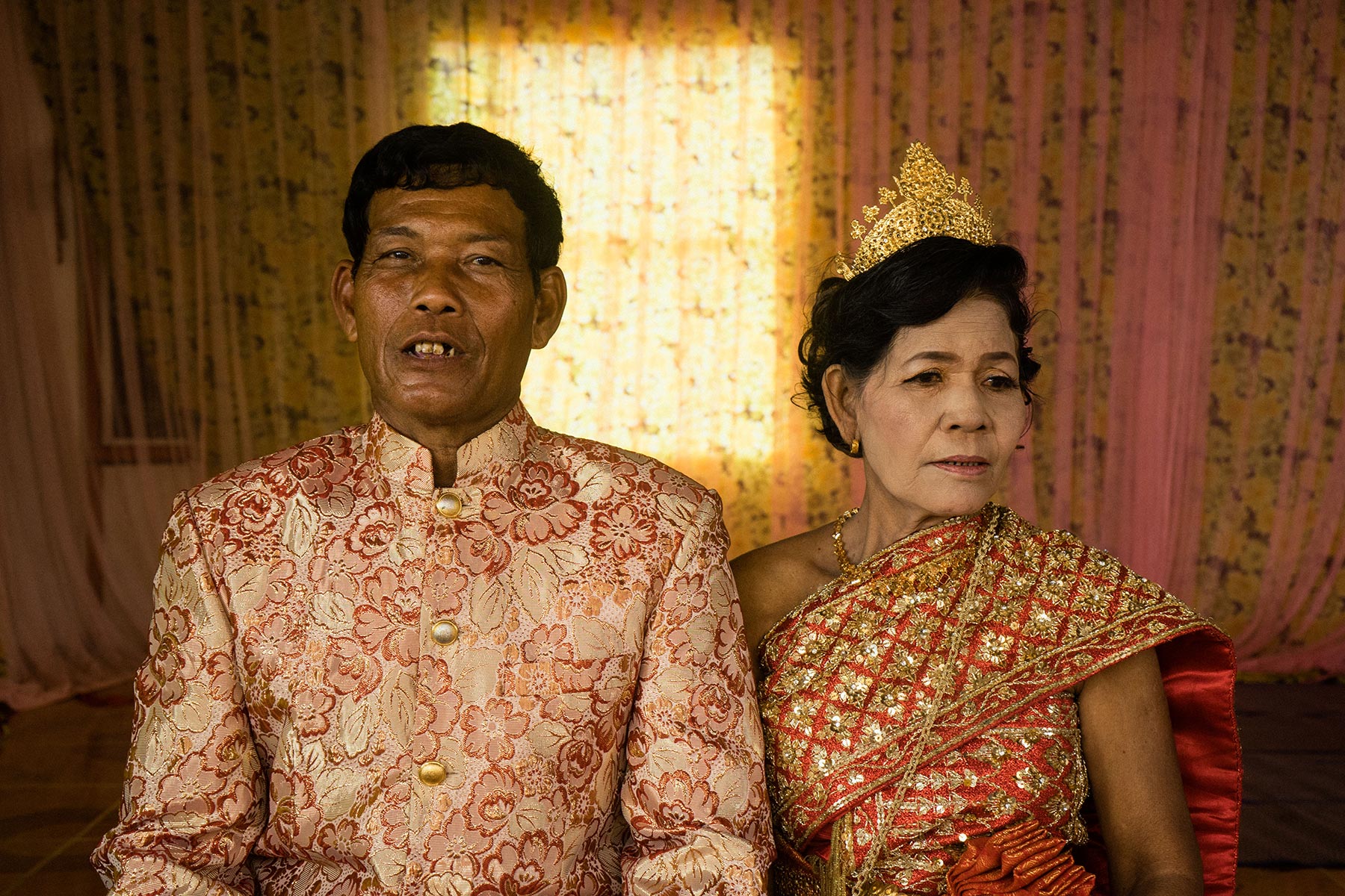 Morb Heang and Nou Sout pose on the day they renewed their vows. (Credit: Hannah Reyes)