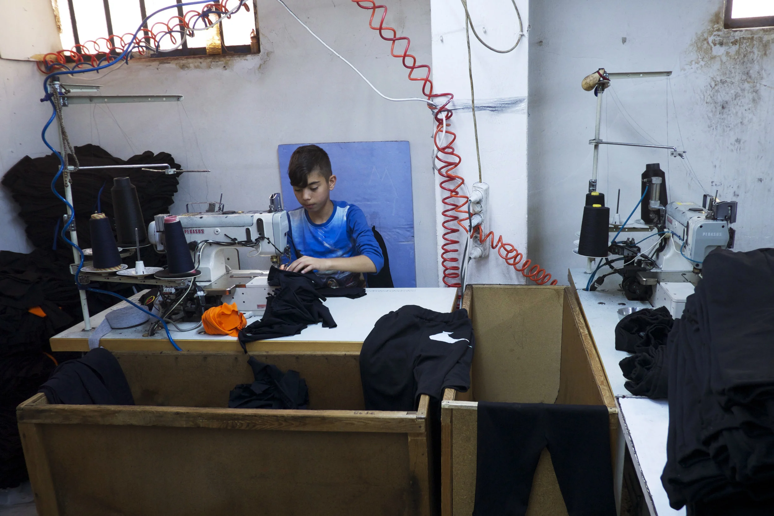 Up to 500,000 Syrian refugees are estimated to be working in Turkey's textile industry, and many of them are children. (Credit: Dene-Hern Chen)