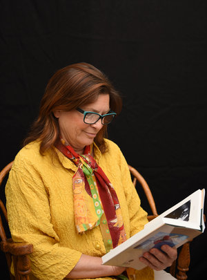 Kitty+reads+a+client's+book.jpeg