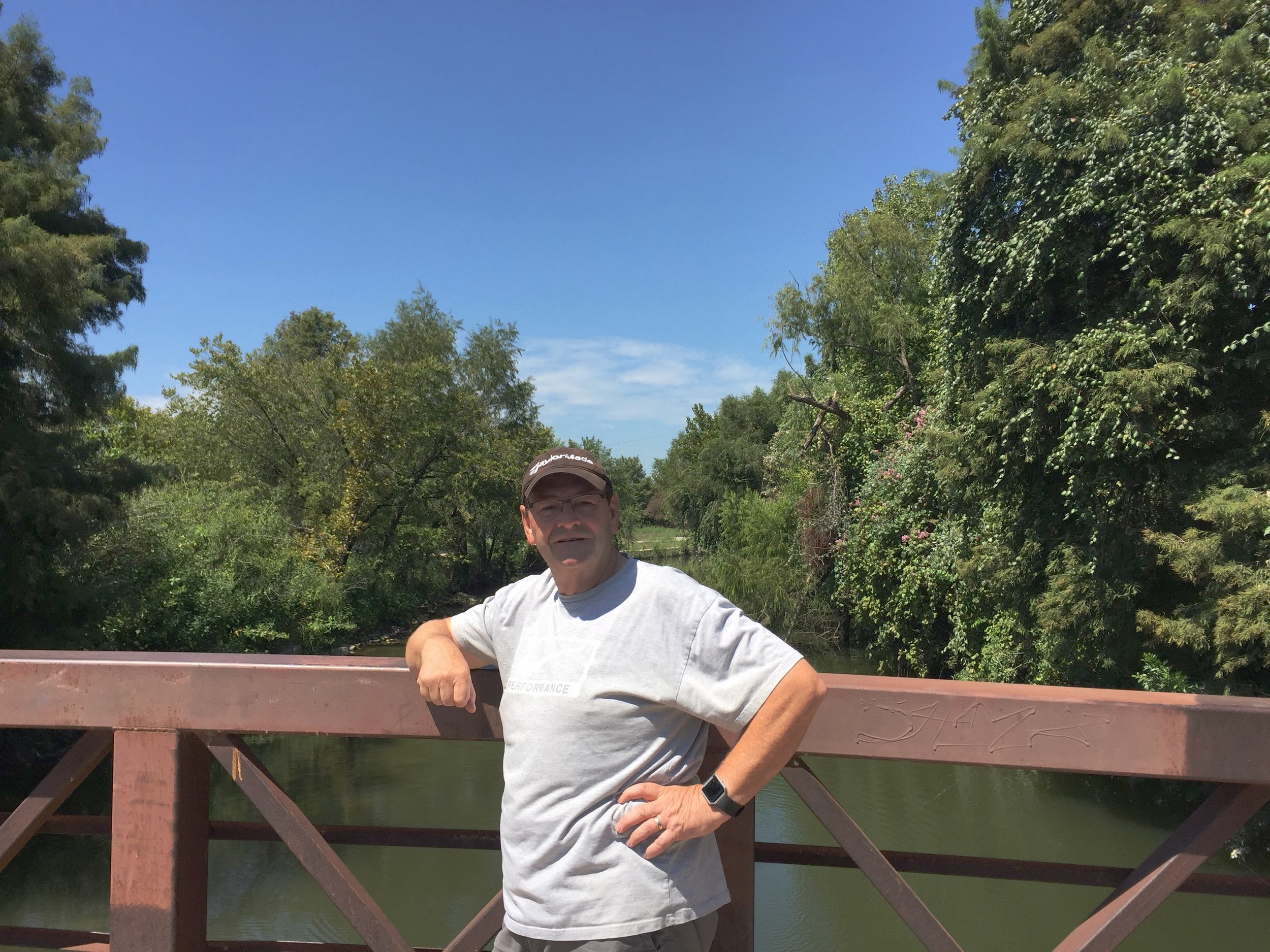 Colin Wright posing on a bridge