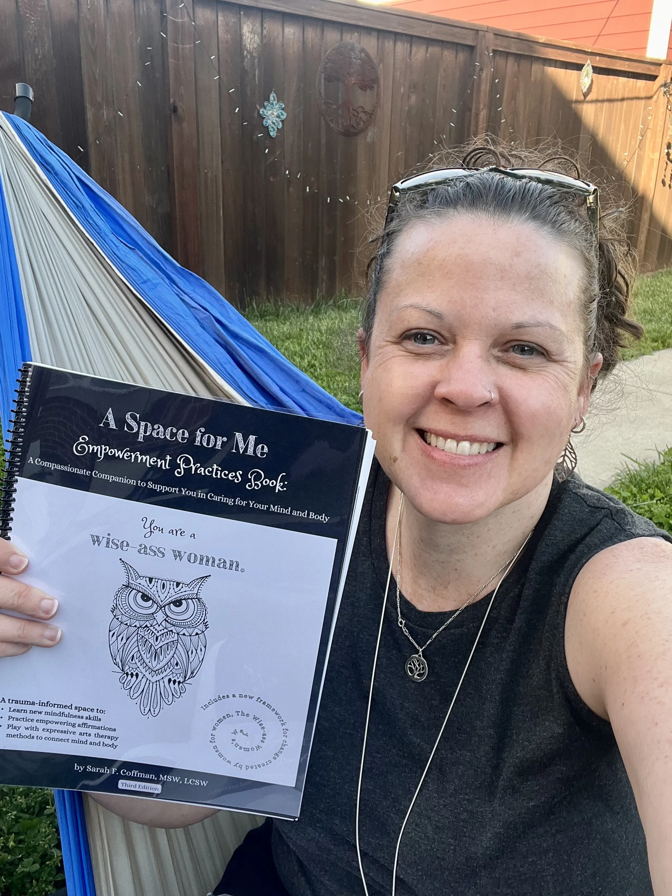 Sarah with 3rd edition of EP book.jpeg