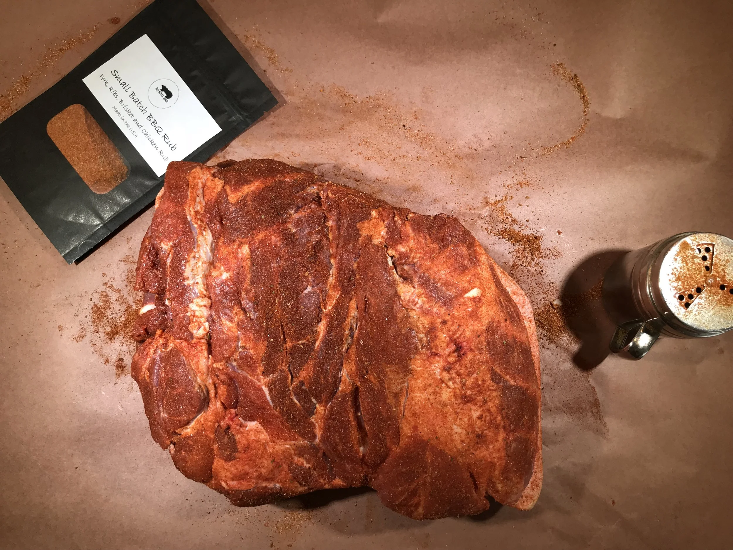Pork Shoulder (pork butt) add Pork, Ribs, Brisket and Chicken Rub and smoke around 250 F until internal temperature reaches 190 F. The rule is about 1 hour per pound. Make sure to spray the Pork Shoulder periodically with water or apple juice so it doesn't get dry. I smoke mine fat up. 