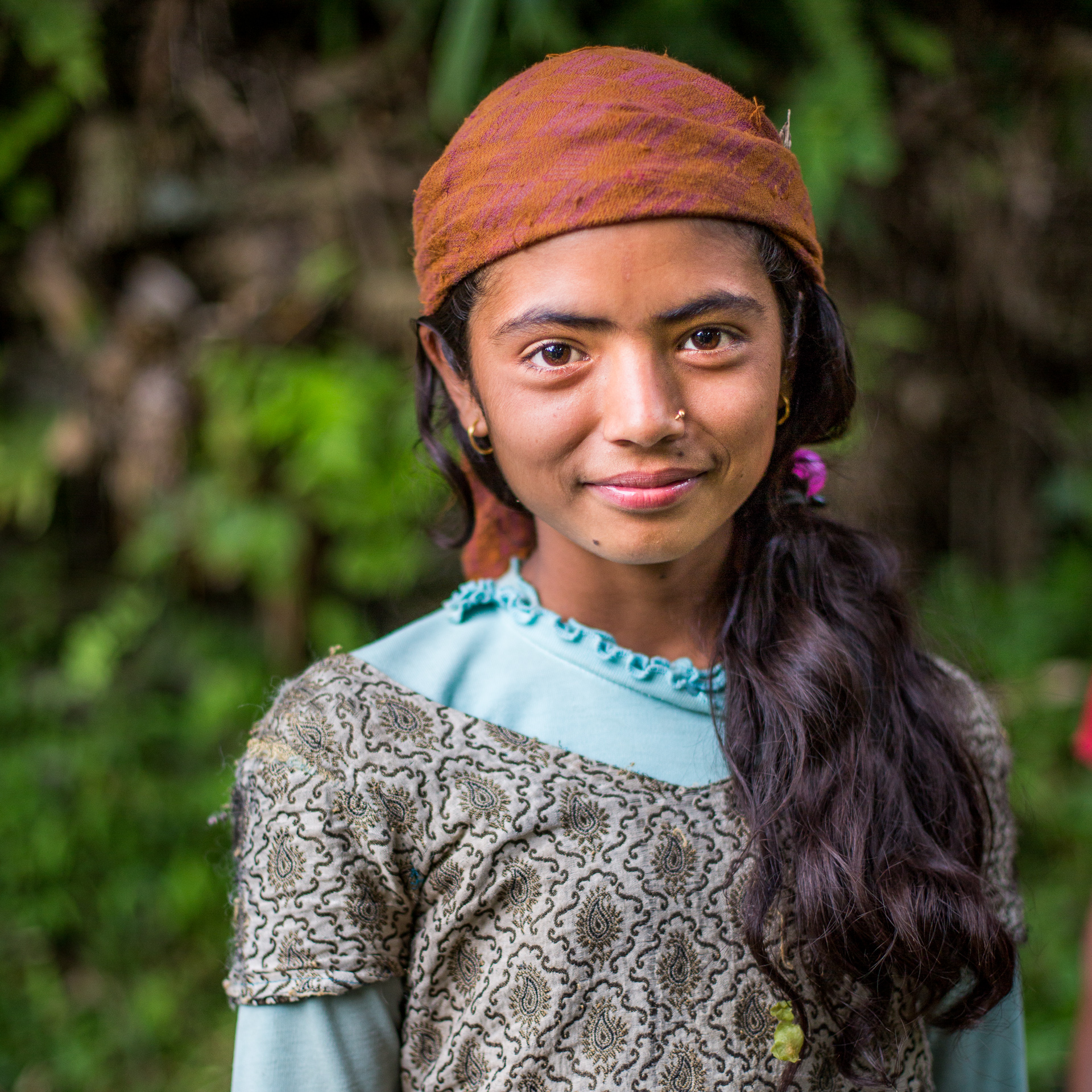 Children are excused from school to help their parents in this busy rice planting season. 